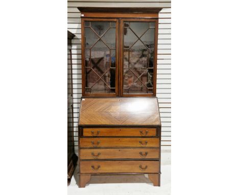 Edwardian mahogany bureau bookcase&nbsp;in the George III style, having ebony and satinwood inlay, the top with twin astragal