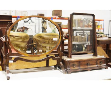 George II mahogany dressing table mirror, the plate of rectangular form, the platform base with three drawers, on short brack