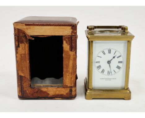 Early 20th century French eight-day striking brass cased carriage clock, the enamel dial with roman numeral hour markers, sig