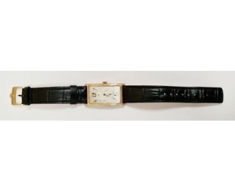 Early 20th century gentleman's manual wind wristwatch with Rolex movement, the rubbed rectangular dial with Arabic hour marke