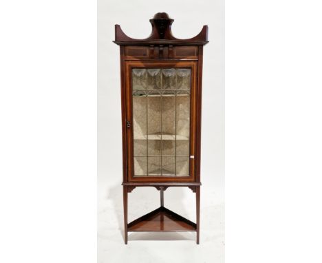 Edwardian mahogany and satinwood inlaid corner cabinet&nbsp;with shaped top rail over a single leaded glazed door with clear 