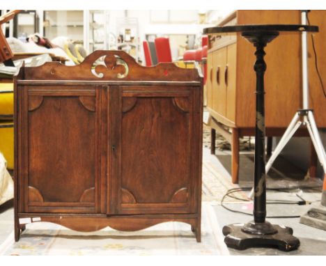 Late 19th century mahogany hanging cupboard&nbsp;with shaped pierced top rail, two cupboard doors opening to a shelf (with ke