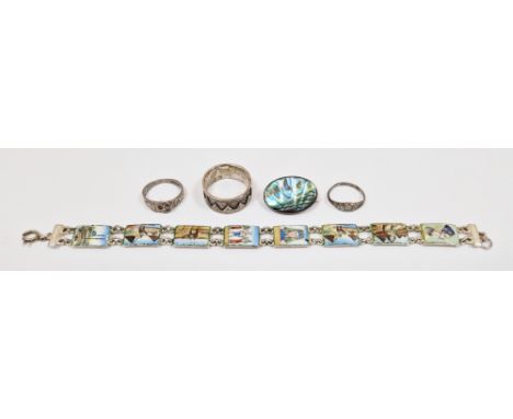 Egyptian white metal bracelet having eight enamelled panels depicting tourist scenes, 19.5cm long together with three silver 