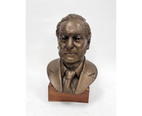 Bronzed fibreglass bust of a middle-aged man with sideburns and wearing a shirt and tie, held on a wooden base, 49cm high&nbs