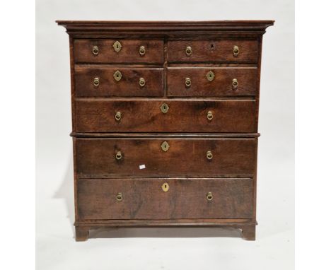 18th century oak chest of drawers with rectangular top, the body split into two sections, comprising four short and three lon