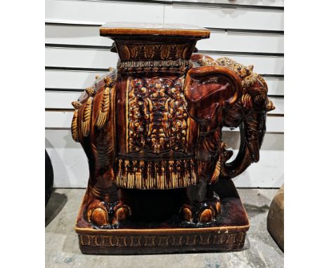 Chinese brown glazed ceramic stool/stand in the form of an elephant, 57cm high&nbsp;Condition ReportSurface scratches, some c