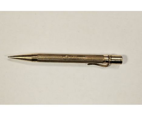 Sampson Mordan &amp; Co 9ct yellow gold cased propelling pencil, having engine-turned decoration and cartouche engraved with 