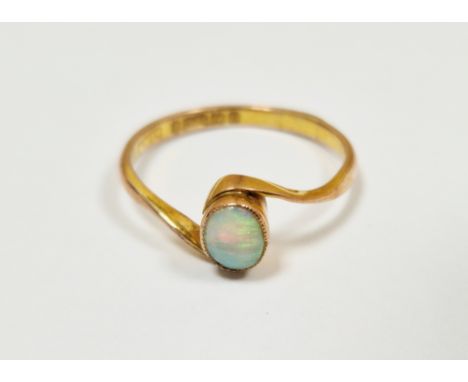 9ct yellow gold opal cross-over ring, the single oval cabochon opal in a rub over setting, size N, approximate weight 1.5 gra