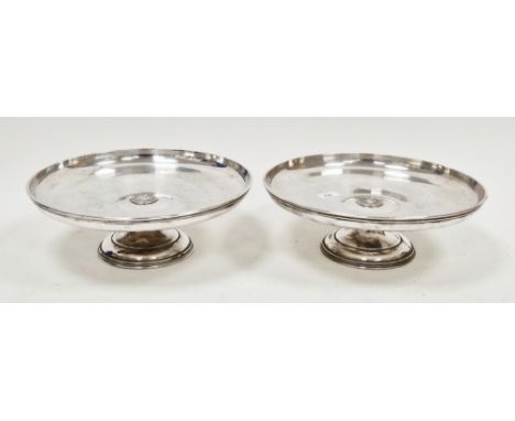 Pair of American silver plated comports&nbsp;by R Wallace, of circular form, the centres inset with an embossed&nbsp; plaque 