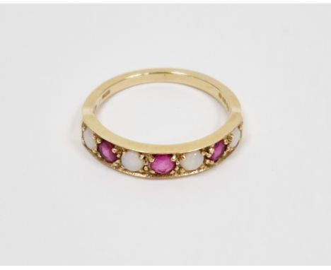 9ct yellow gold ruby and opal ring, claw set with a row of three round rubies and four round opals, size M 1/2, approximate w