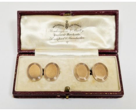 Pair of 9ct yellow gold oval double link cufflinks, each with reeded borders, in a Penlington V Batty case, approximately 8.6