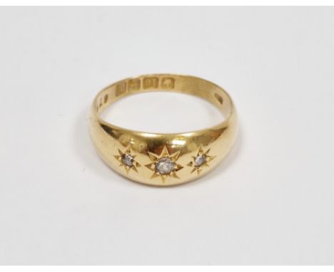 18ct gold and three-stone diamond gypsy-set ring&nbsp;having three old cut stones in star settings, hallmarked Birmingham 192