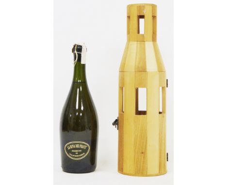 Bottle of Prosecco Valdobbiadene in wooden bottle shaped presentation case