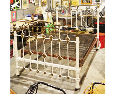 Late 19th/early 20th century brass and white painted iron double bedstead, on castors, 150cm high x 208cm long x 139cm wide&n