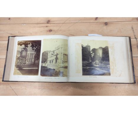 Photographs. Various.&nbsp;Oblong folio album, worn cond., cont. approx. 100 photographs, various sizes, Castle Ashby (1869 e