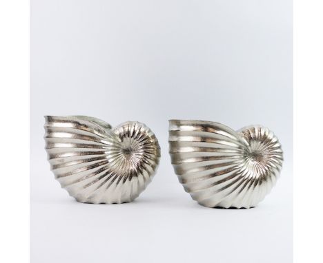 AMMONITE FORM CHAMPAGNE COOLERS, A PAIR. polished metal, 18.5cm H at tallest approx. (2).