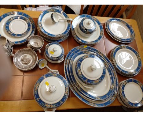 A dinner service with floral pattern on a blue border (47 pieces) and six cups and saucers printed in Sepia with Greyhound pa