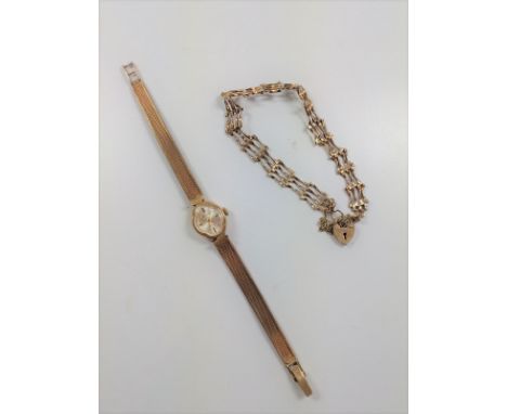 A ladies 9ct gold wristwatch and a 9ct gold gate bracelet. 