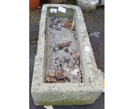 Carved stone trough planter