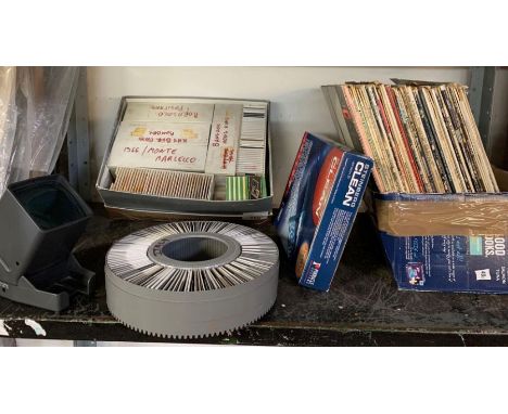 Pictures slides including Bangkok, Hong Kong and others, record player, slide viewer etc
