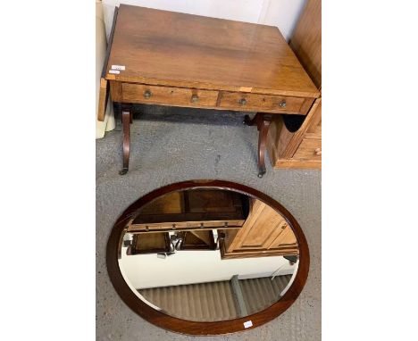 Edwardian sofa table, swept legs and brass casters along with large oval framed mirror