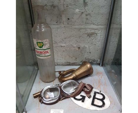 Motoring interest - Collectables to include a BP Energol motor oil glass bottle, part of a brass horn, driving goggles and a 