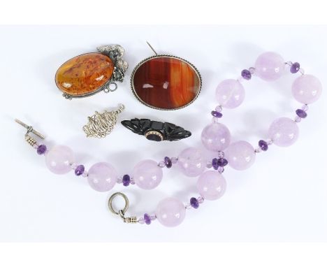 Miscellaneous jewellery, including a amethyst beaded necklace approx 41 cms; together with a silver pendant; a stone brooch, 