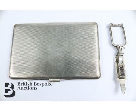 Silver cigarette case Birmingham hallmark, mm W.W. Ltd engine-turned approx 8 x 12.5 cms together with a silver handled&nbsp;