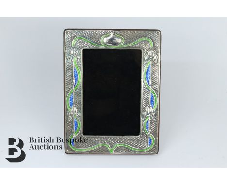 Silver and enamel photo frame, easel back, approx 20 x 15 cms.&nbsp;