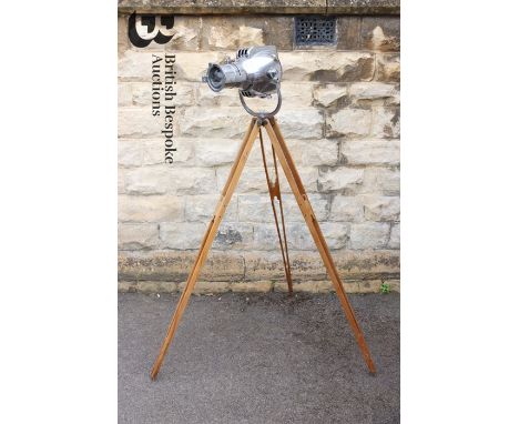 1950's Strand Electric model nr 23 vintage theatre spot light, raised on a stained pine tripod base, markings to the rear of 