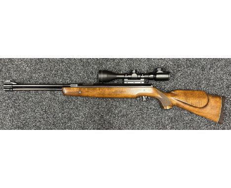 Weihrauch Model HW77K .22 Cal Air Rifle serial no. 1018408 with 365mm long barrel. Fitted with a Tasco 3-9x50E Telescopic Sig