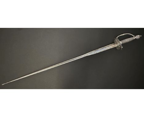 Small Sword with incurved triangular section blade 810mm in length. No makers marks. Silver peirced cirular guard with piled 