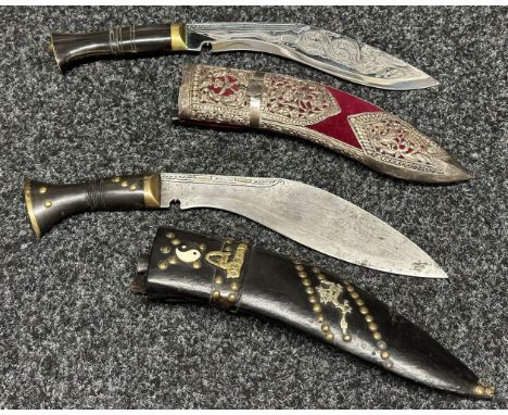 Pair of Gurhka Kukri Knives: One with a single edged blade 245mm in length engraved with a Dragon. Overall length 375mm. Comp