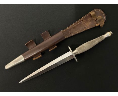 WW2 British 2nd Pattern Fairbairn-Sykes Fighting Knife. Early Nickle finish knife with 169mm long blade. Crossguard is marked