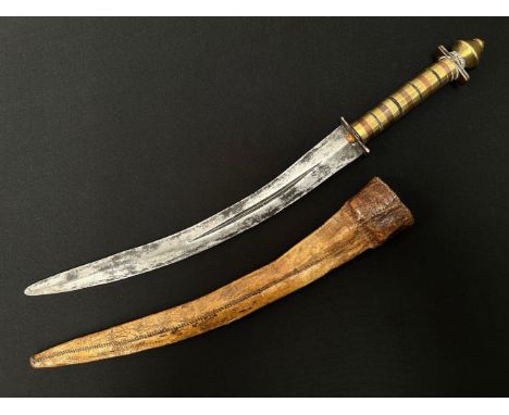 Dagger with curved double edged fullered blade 314mm in length. Decorative grip made from brass, copper and horn. Overall len