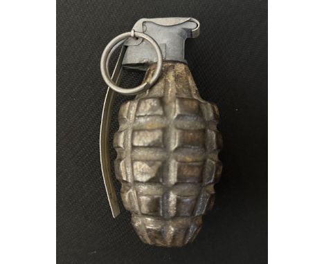WW2 US MKII "Pineapple" Hand Grenade complete. Solid base to the cast grenade body. Fitted with Fuze M10A3 which is complete 