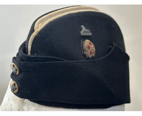 WW2 British East Lancs Regiment Officers Coloured Field Service Cap. Silver mounted buttons to front, Silver Sphinx and Bulli