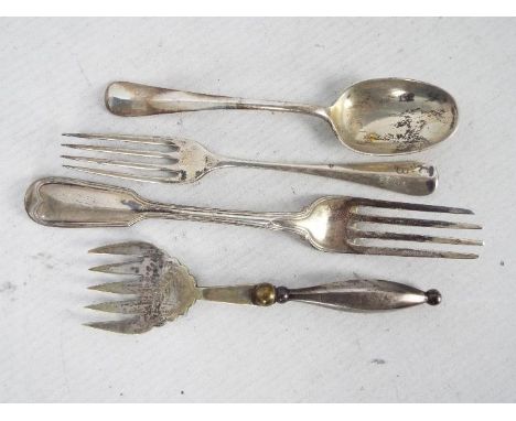 Four pieces of hallmarked silver flatware, Victorian and later to include two forks, one spoon and a silver handled fork, app