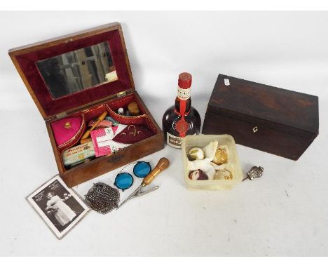 Mixed lot to include a vintage sewing box with contents, 500 ml bottle of Grand Marnier Cordon Rouge, four vintage golf balls