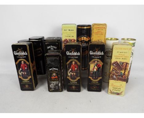 A collection of vintage whisky presentation tins / tubes, all empty, to include Glenfiddich Clans Of The Highlands, Glenmoran