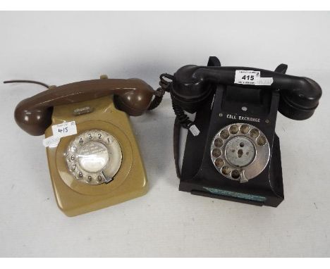 Two vintage dial telephones. [2]