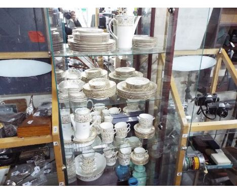 Royal Worcester - A quantity of dinner and tea wares in the Hyde Park pattern, approximately 112 pieces.