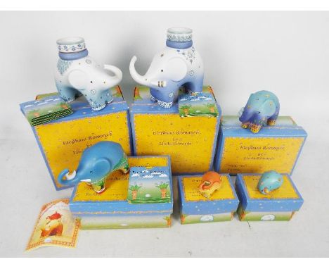 A collection of Goebel Elephant Romance figures by Linda Edwards, contained in original boxes.