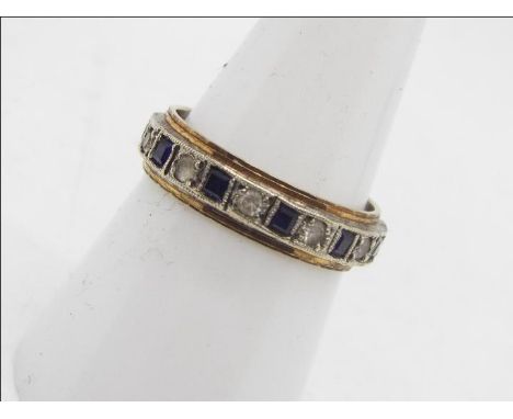 A 9ct gold sapphire and white stone eternity ring, size O , approximately 3.8 grams.