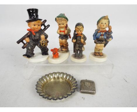 Four Goebel / Hummel figurines including two chimney sweeps and a plated dish and vesta case.