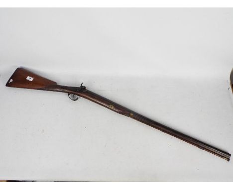 A (nominally) 12 gauge sporting shotgun marked to the lock plate D.Egg. The lock plate and hammer engraved with a vine leaf d