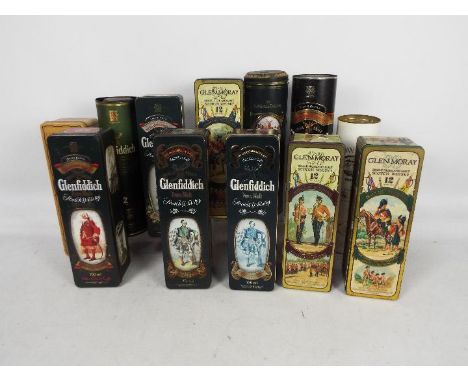 A quantity of vintage whisky presentation tins / tubes, all empty, to include Glenfiddich Clans Of The Highland, Glen Moray H