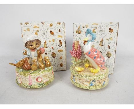 Beatrix Potter - two ceramic musicals comprising Mrs Tiggy-Winkle playing tune 'In the garden' # 199605, and Jemima Puddle-Du