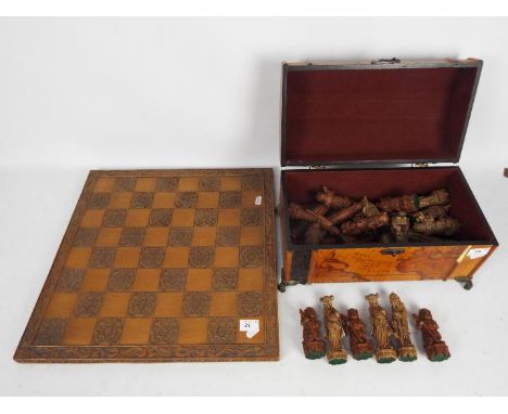 A Chinese style chess set and board with 13 cm king. [2]