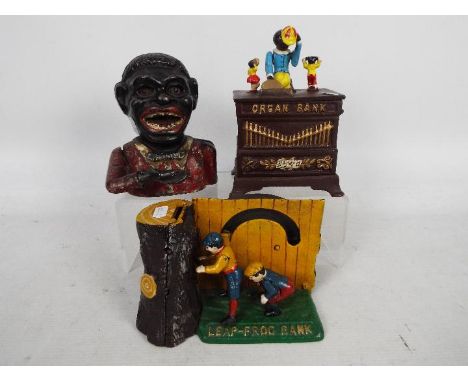 A vintage cast iron Jolly Bank and two further cast iron money banks comprising Organ Bank and Leap Frog. [3]Note: Mechanical